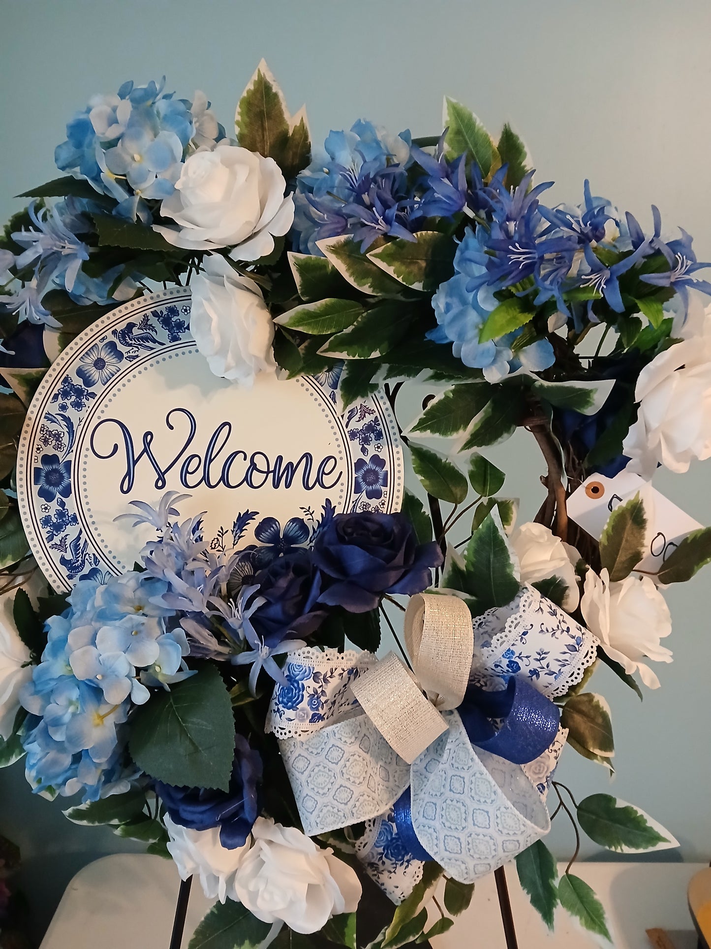 18" Grapevine Spring Wreath – Blue & White Flowers with Welcome Sign