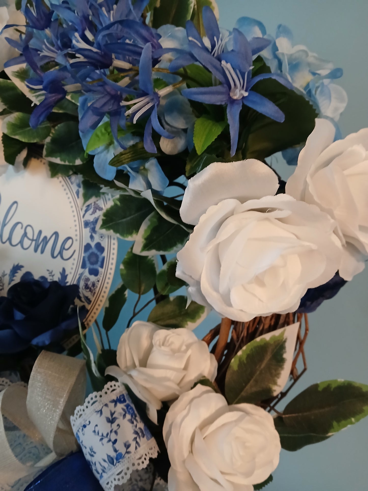18" Grapevine Spring Wreath – Blue & White Flowers with Welcome Sign